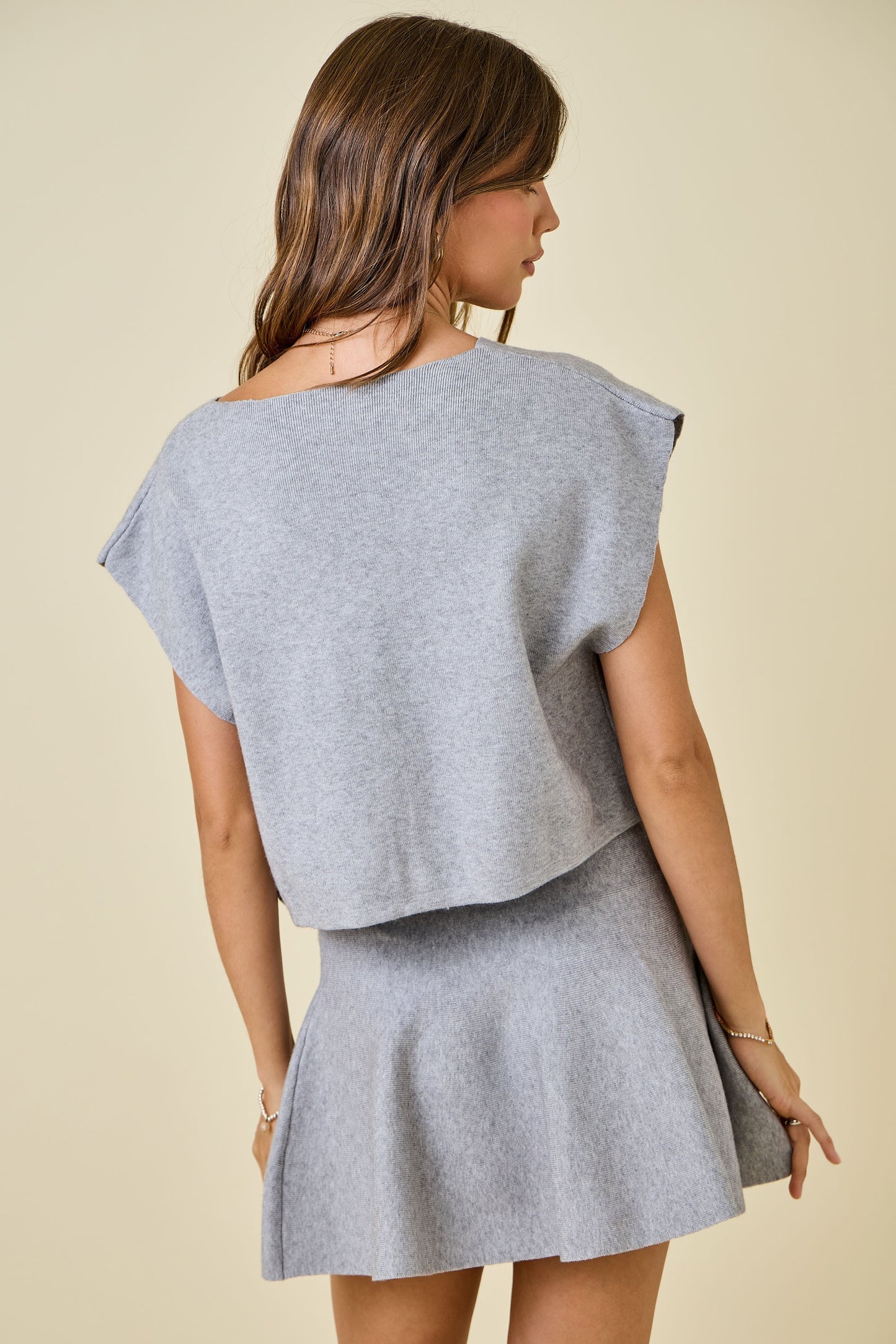 Sleeveless V-neck Sweater Top & Mini Skirt
