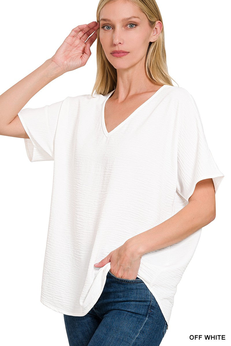 WOVEN AIRFLOW V-NECK SHORT SLEEVE TOP