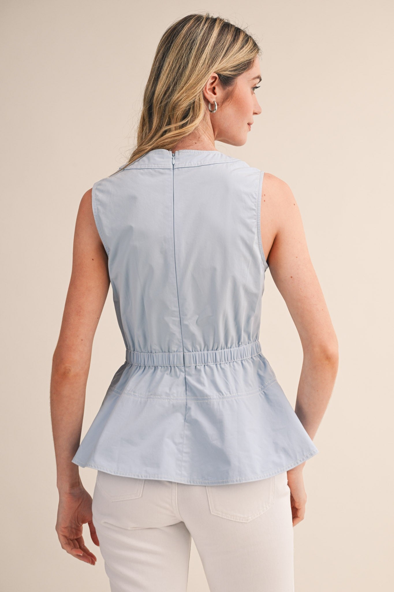 Sleeveless Belted Peplum Top