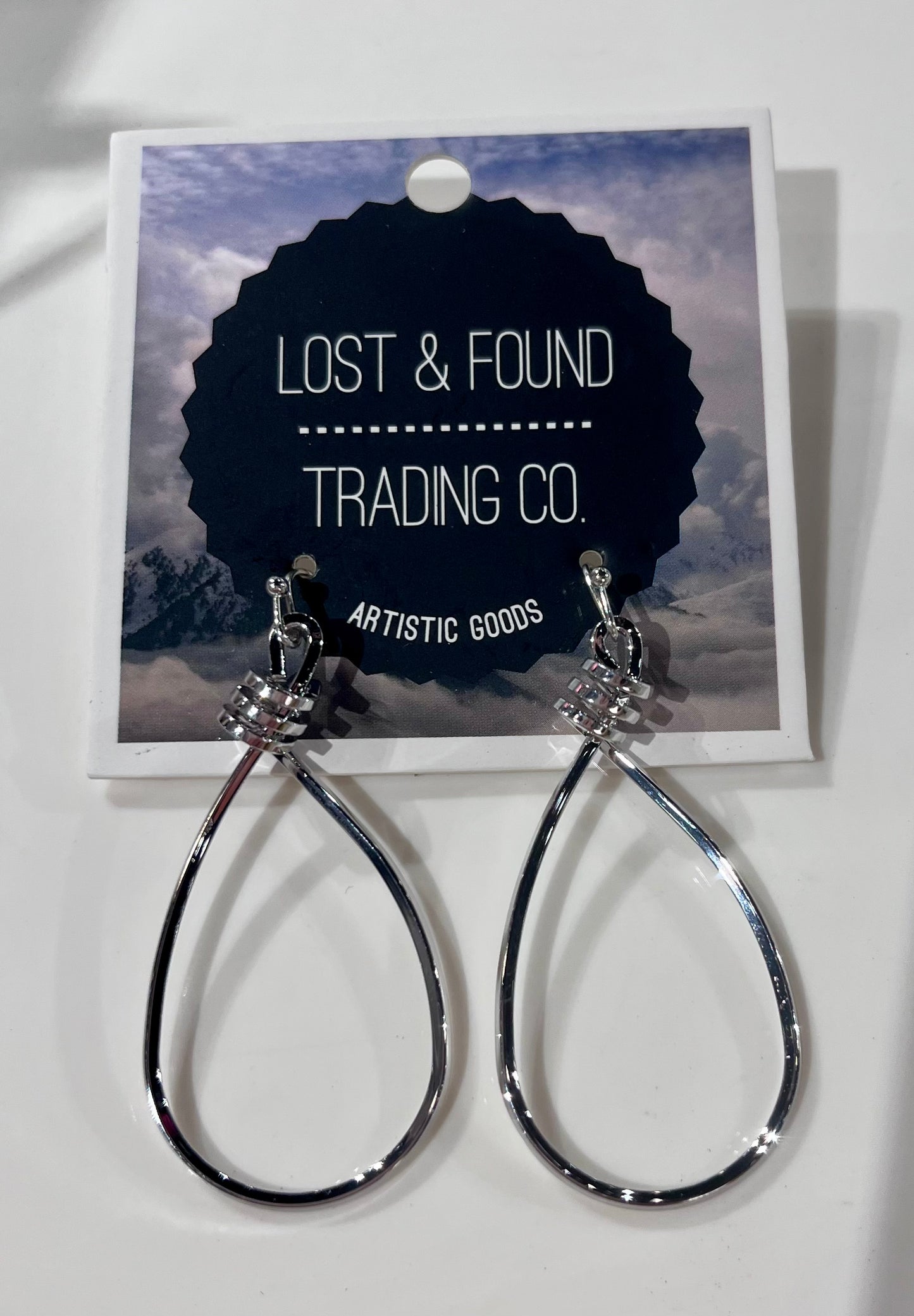 Silver oval hoops