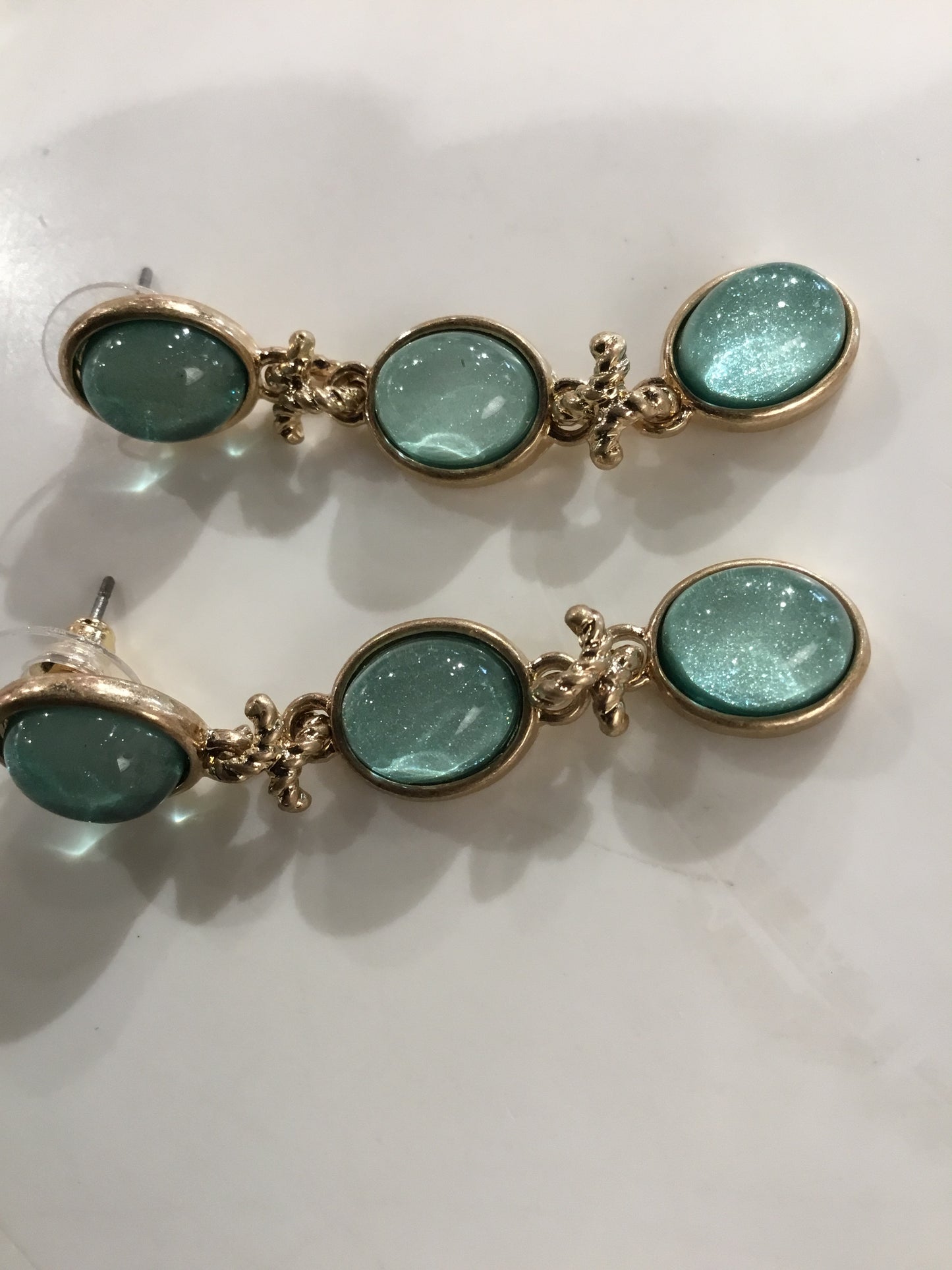 Gold Three Tier Oval Dangle earrings with Aqua stone