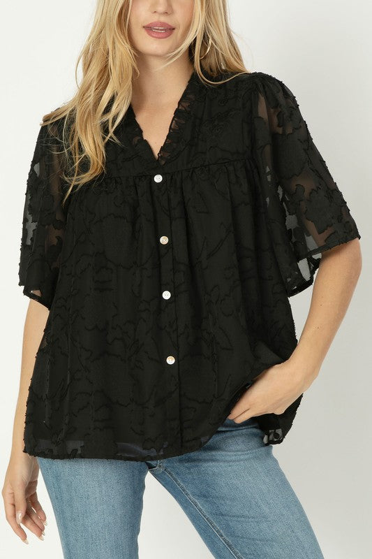 A line blouse with ruffle trim