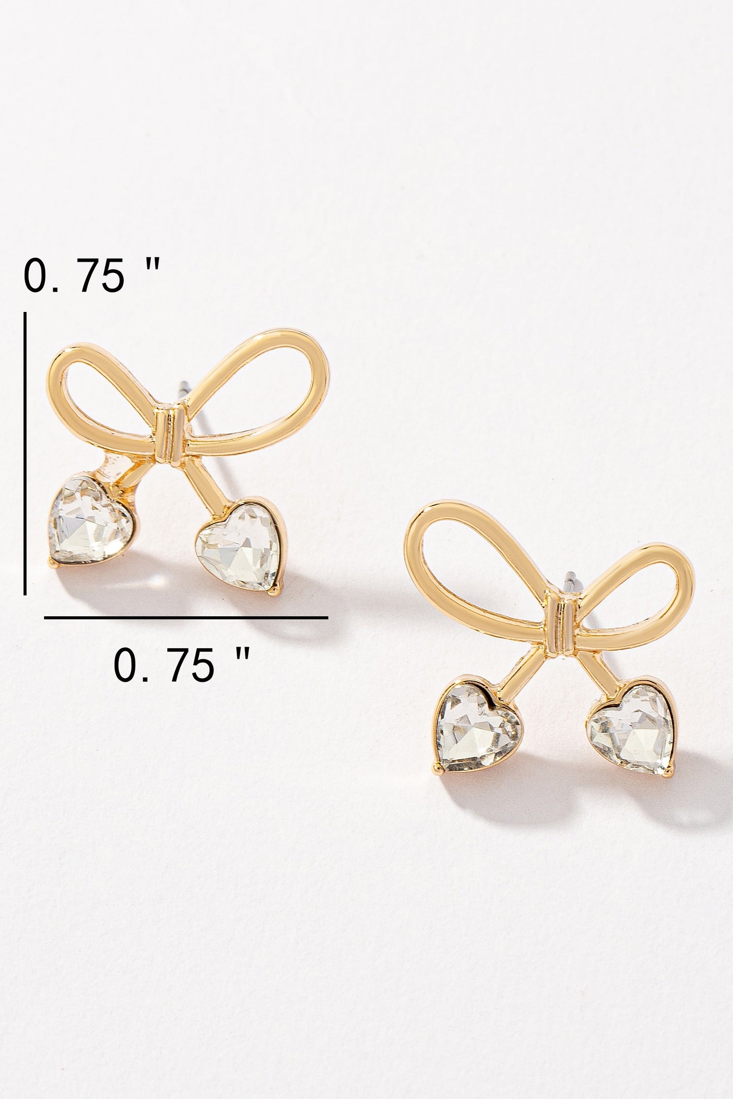 Bowtie earrings with heart shape stones