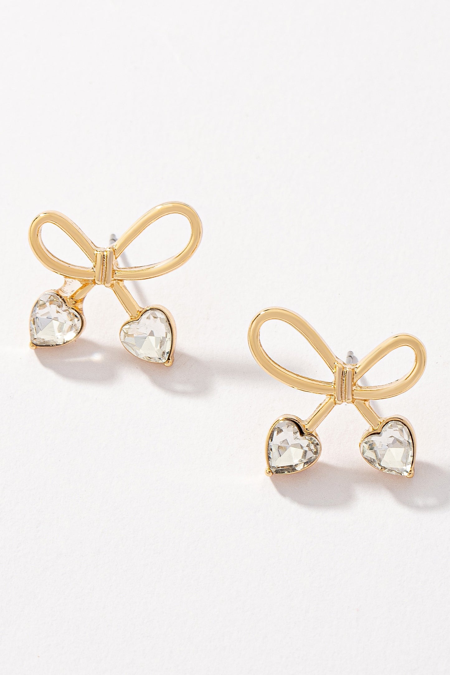 Bowtie earrings with heart shape stones