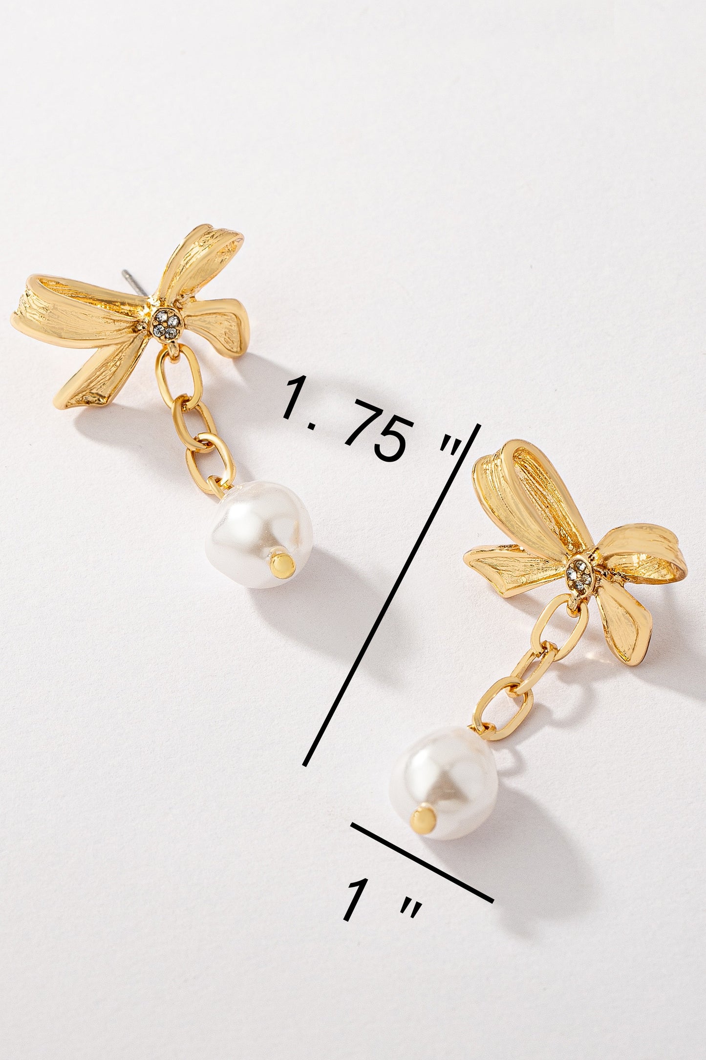 Bowtie stud pearl drop earrings