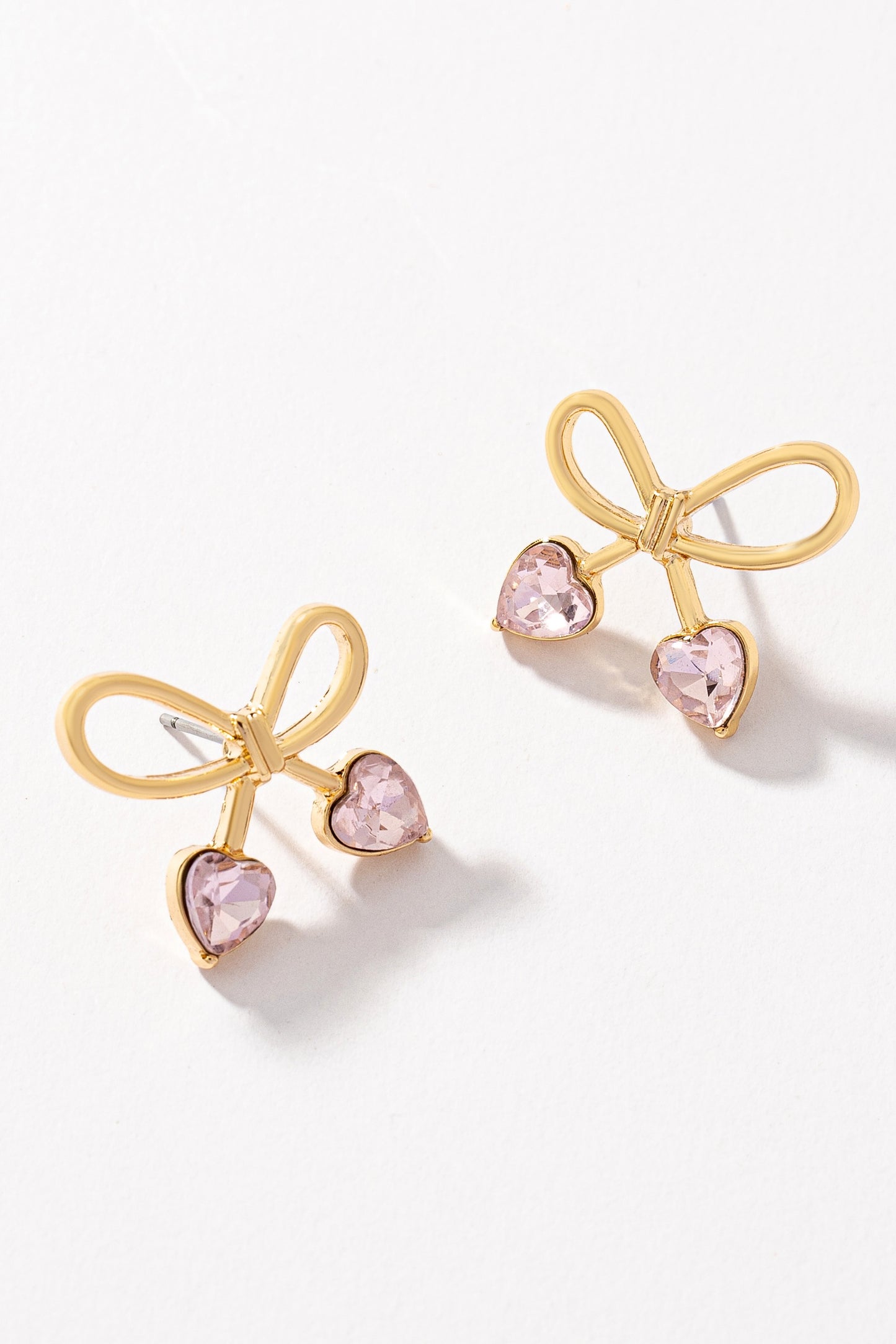 Bowtie earrings with heart shape stones