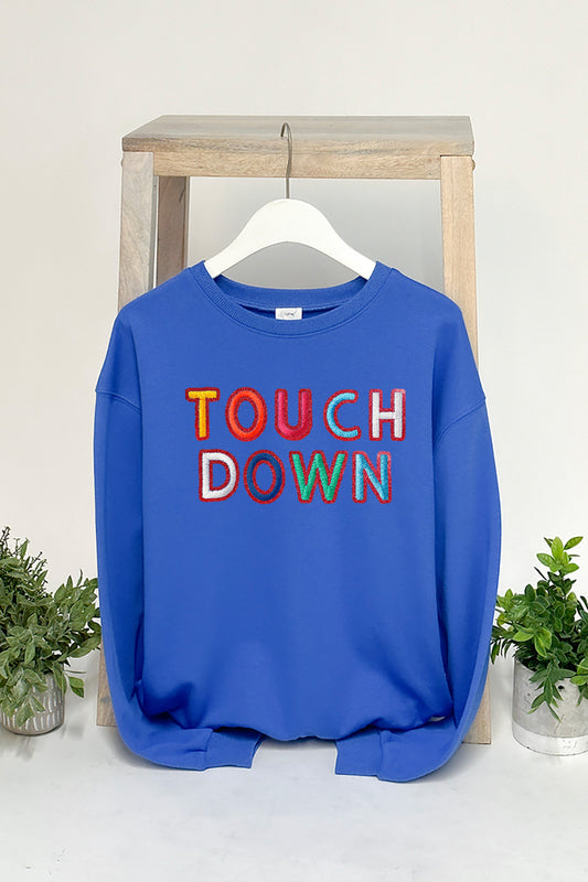 GLITTER TOUCH DOWN GRAPHIC SWEATSHIRT