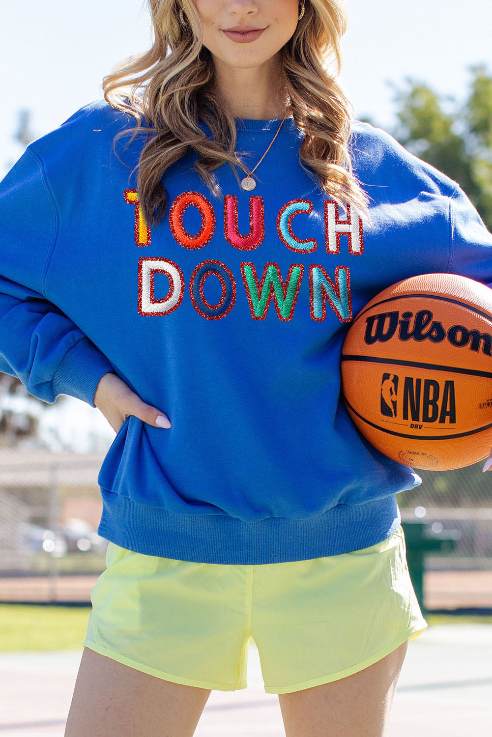 GLITTER TOUCH DOWN GRAPHIC SWEATSHIRT