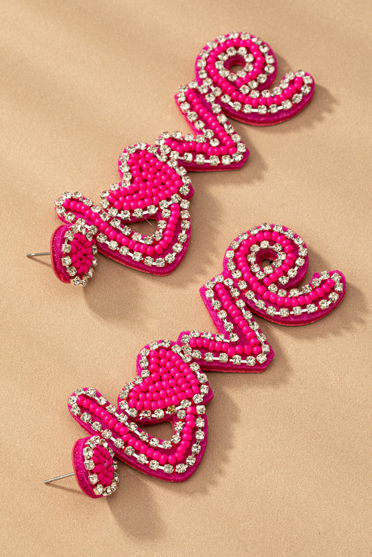 Hot pink love seed earrings