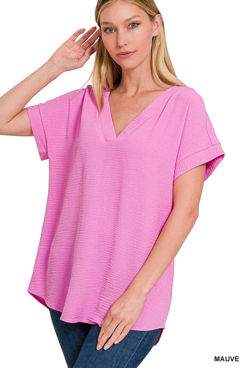 WOVEN AIRFLOW V-NECK HI-LOW HEM TOP